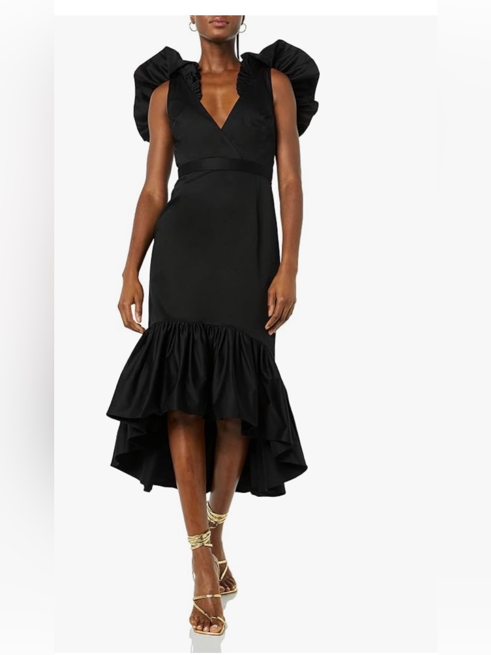 “Making the Cut” flounced Sleeveless Dress with shoulder detail.